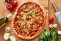 Homemade Margarita Flatbread Pizza with Tomato and Basil. Royalty Free Stock Photo