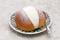 Homemade Maritozzo is italian roman breakfast sweet that whipped cream sandwiched between brioche.