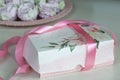 Homemade marshmallows packed in a gift box. Tied with ribbon. Zephyr gift. Close-up Royalty Free Stock Photo