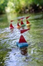 Homemade mast boats from kitchen sponges. Tilted horizon