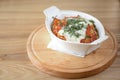 Homemade meat lasagna served in white bowl over light rustic wooden background. Royalty Free Stock Photo