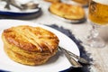 Homemade meat pie and beer on a rustic table Royalty Free Stock Photo