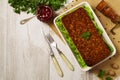 Homemade meat pie with vegetables, served with cranberry sauce Royalty Free Stock Photo