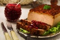 Homemade meat pie with vegetables, served with cranberry sauce Royalty Free Stock Photo