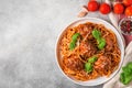 Homemade meatballs with pasta spaghetti, tomato sauce, parmesan cheese and basil on concrete background. top view Royalty Free Stock Photo