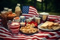 Homemade Memorial Day garden picnic with popcorn, cookies and candy in American festive style.