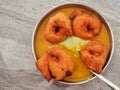 Homemade mendu vada sambhar with chutney in plate on kitchen floor Royalty Free Stock Photo