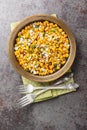 Homemade Mexican Street Corn Esquites Salad with jalapeno, cilantro, Cotija cheese, onion and spices seasoned with sour cream