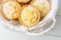 Homemade mince pies. Traditional British Christmas pastry dessert with apples raisins nuts filling in wicker basket. Golden Crust