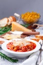 Homemade minestrone soup with cavatappi pasta, beans and vegetables, vertical Royalty Free Stock Photo