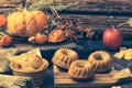 Homemade mini apple guglhupf on rustic background with autumn decoration Royalty Free Stock Photo