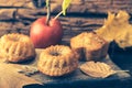 Homemade mini apple guglhupf on rustic wooden background Royalty Free Stock Photo