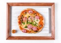 Homemade Mini Pizza With Sausage, Mushroom And Cheese On The White Board In The Wooden Picture Frame
