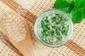 Homemade mint exfoliating scrub scalp peeling, bath salt, foot soak with sugar, mint leaves, olive oil, essential mint oil