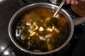 Homemade miso soup with mushrooms in a pan