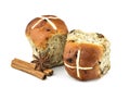 Homemade mixed fruit and cinnamon easter hot cross buns on white