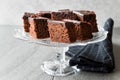 Homemade Moist Chocolate Sponge Cake Brownie Pieces in Vintage Glass Dessert Stand. Royalty Free Stock Photo