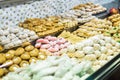 Homemade Moroccan pastries displayed in a traditional food marke