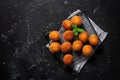 Homemade muffins. Black stone grunge background. Top view