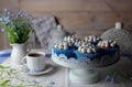 Homemade muffins with whipped cream and a flower