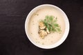 Homemade mushroom soup in a bowl on a dark background Royalty Free Stock Photo