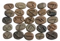 Homemade mystical magic rune signs made of clay isolated