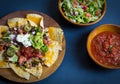 Homemade Nachos with tortilla chips cheese and guacamole