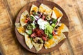 Homemade Nachos with tortilla chips cheese and guacamole