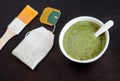 Homemade natural mask scrub with sea salt and green tea extract. Diy cosmetics. Royalty Free Stock Photo