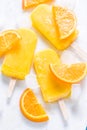 Homemade, natural orange ,refreshing summer popsicle Royalty Free Stock Photo