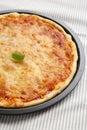 Homemade Neopolitan Pizza with Cheese and Basil, side view. Close-up Royalty Free Stock Photo