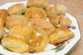 Homemade, no-added-sugar marzipan almonds on a porcelain plate, meticulously crafted