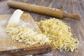 Homemade noodles on wooden table