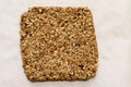 Homemade oat and peanut protein bar, compound cooked before cutting into portions. Royalty Free Stock Photo