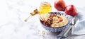 Homemade oatmeal for breakfast with apple, cinnamon and honey Royalty Free Stock Photo