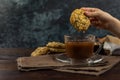 Homemade oatmeal cookies with a cup of cocoa