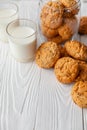 Homemade oatmeal cookies on white wooden table with milk on background Royalty Free Stock Photo