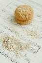 Homemade oatmeal cookies on vintage music sheet Royalty Free Stock Photo