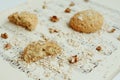 Homemade oatmeal cookies with walnut on vintage music sheet Royalty Free Stock Photo