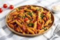Homemade One-Pot Creamy Tuscan Pasta on a Plate, side view