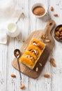 Homemade orange and almond cake on a white wooden background Royalty Free Stock Photo