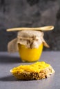 Orange Jam Jar and Bread with Jam on Marble Background