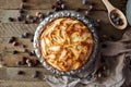 Homemade organic apple pie dessert ready to eat. Delicious and beautiful apple pie on a wooden table, on a rustic wood kitchen tab Royalty Free Stock Photo