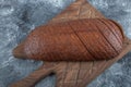 Homemade Organic Pumpernickel Rye Bread on Wooden cutting board Royalty Free Stock Photo