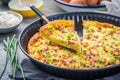 Homemade oven baked frittata with curd cheese, bacon, onion and chives Royalty Free Stock Photo