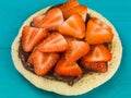 Homemade Pancake With Fresh Sliced Strawberries and Chocolate Spread Royalty Free Stock Photo