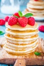 Homemade pancakes with honey and raspberry Royalty Free Stock Photo