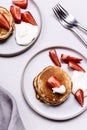 Homemade pancakes with strawberry and whipped cream chantilly