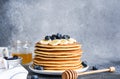 Homemade pancakes with syrup and berries. Morning and breakfast: pancakes with banana and blueberries Royalty Free Stock Photo