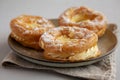 Homemade Paris Brest on a Plate, side view